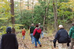 Members walking a trail